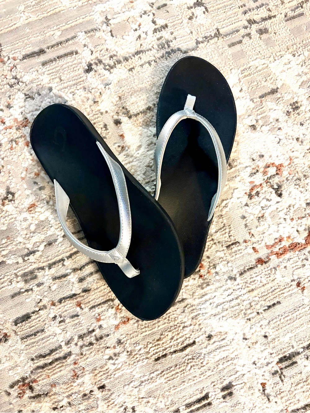 Olukai Silver Metallic Flip Flops with Black Soles - Picture 3 of 6